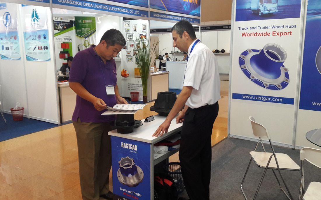 Rastgar wheel hubs and catalogue being reviewed by a visitor at INAPA Jakarta 2017